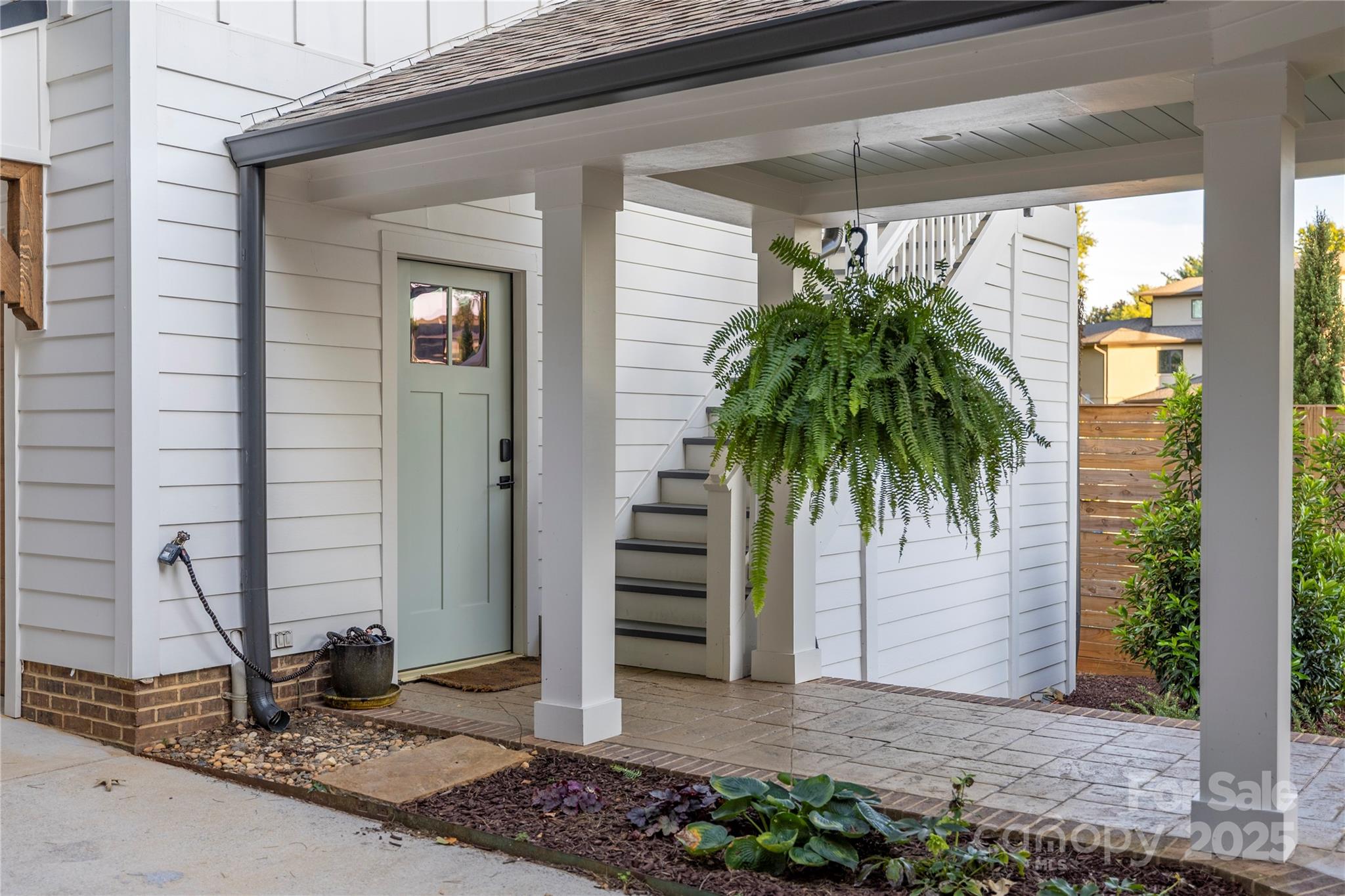 18353 John Connor Road Cornelius, NC 28031 - Photo 35 of 47 a front view of a house with a yard