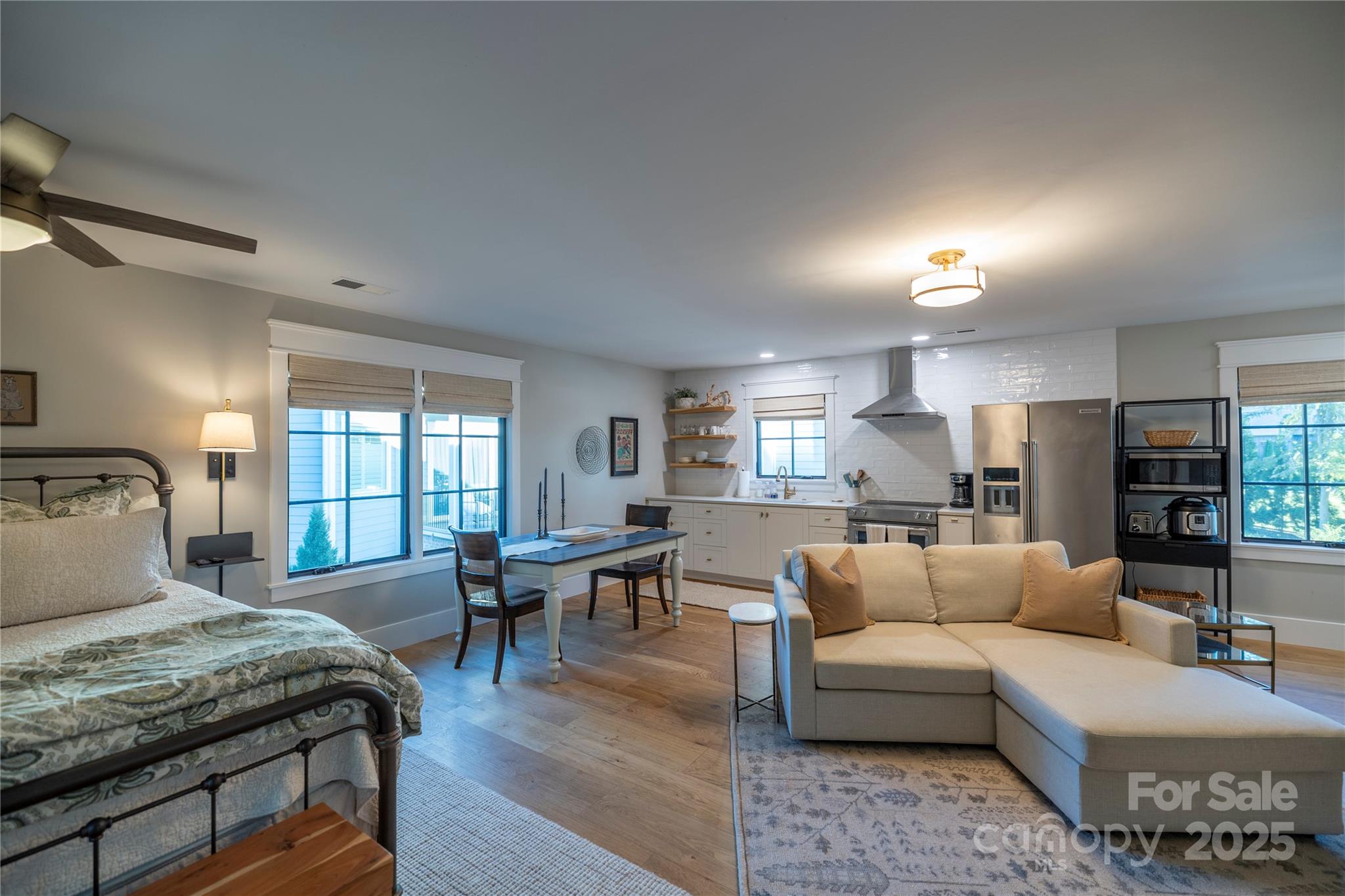 18353 John Connor Road Cornelius, NC 28031 - Photo 36 of 47 a living room with furniture kitchen view and a window