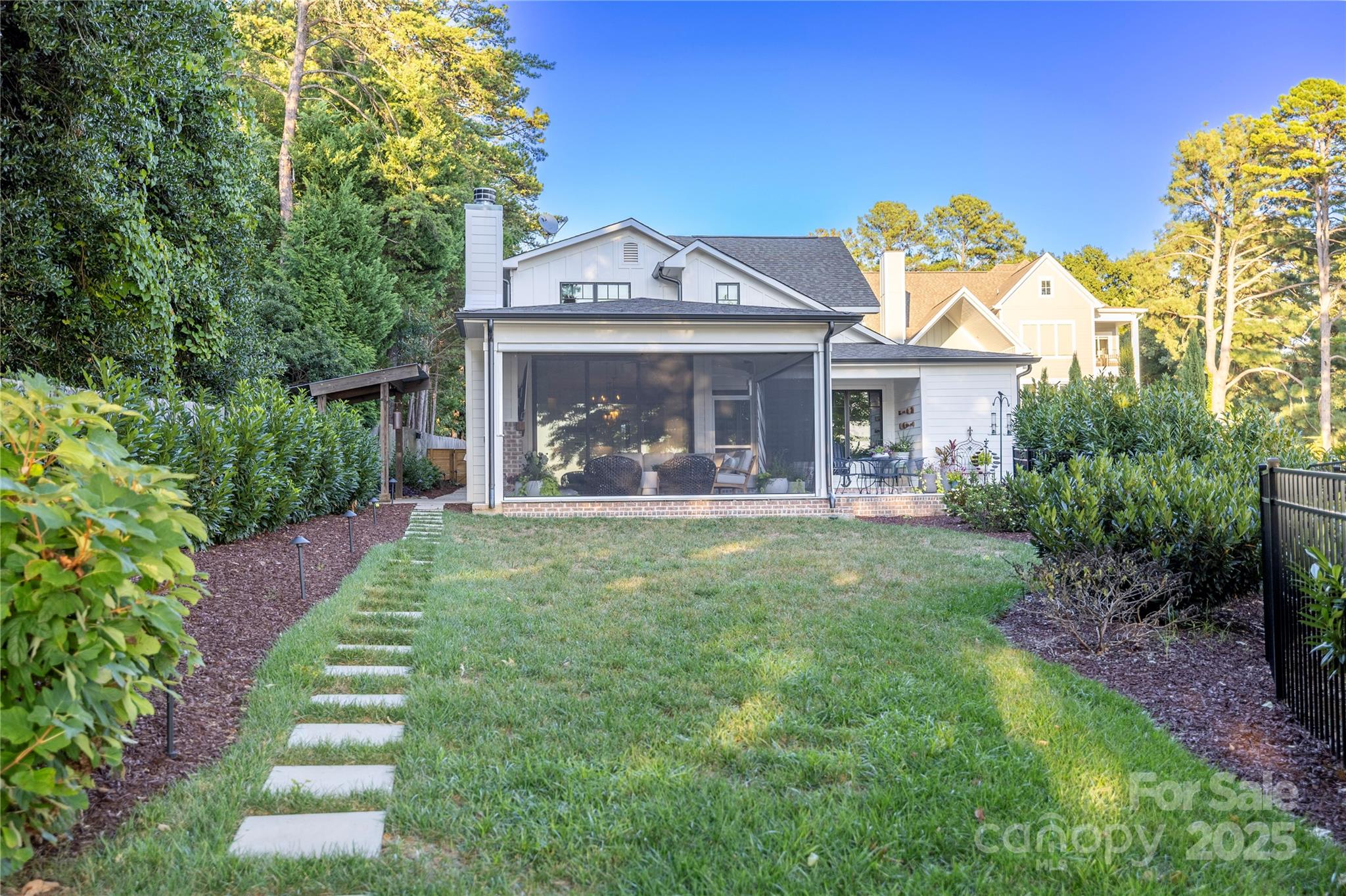 18353 John Connor Road Cornelius, NC 28031 - Photo 45 of 47 a view of a house with a swimming pool