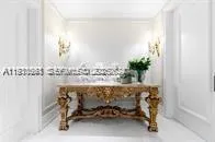 a room with a table and chairs