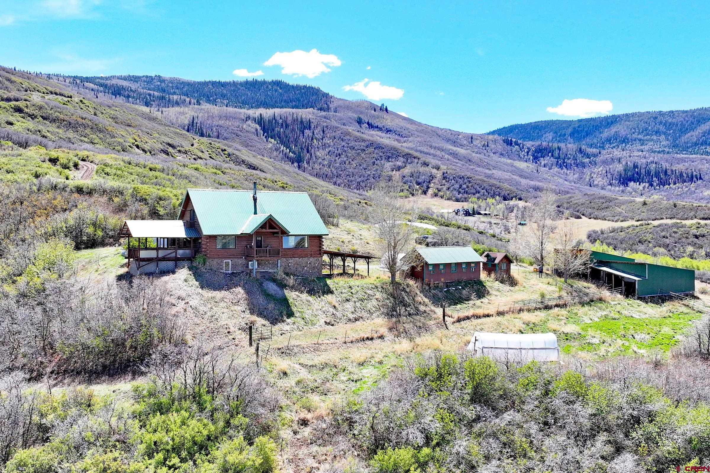 a view of yard with mountain and mountain view