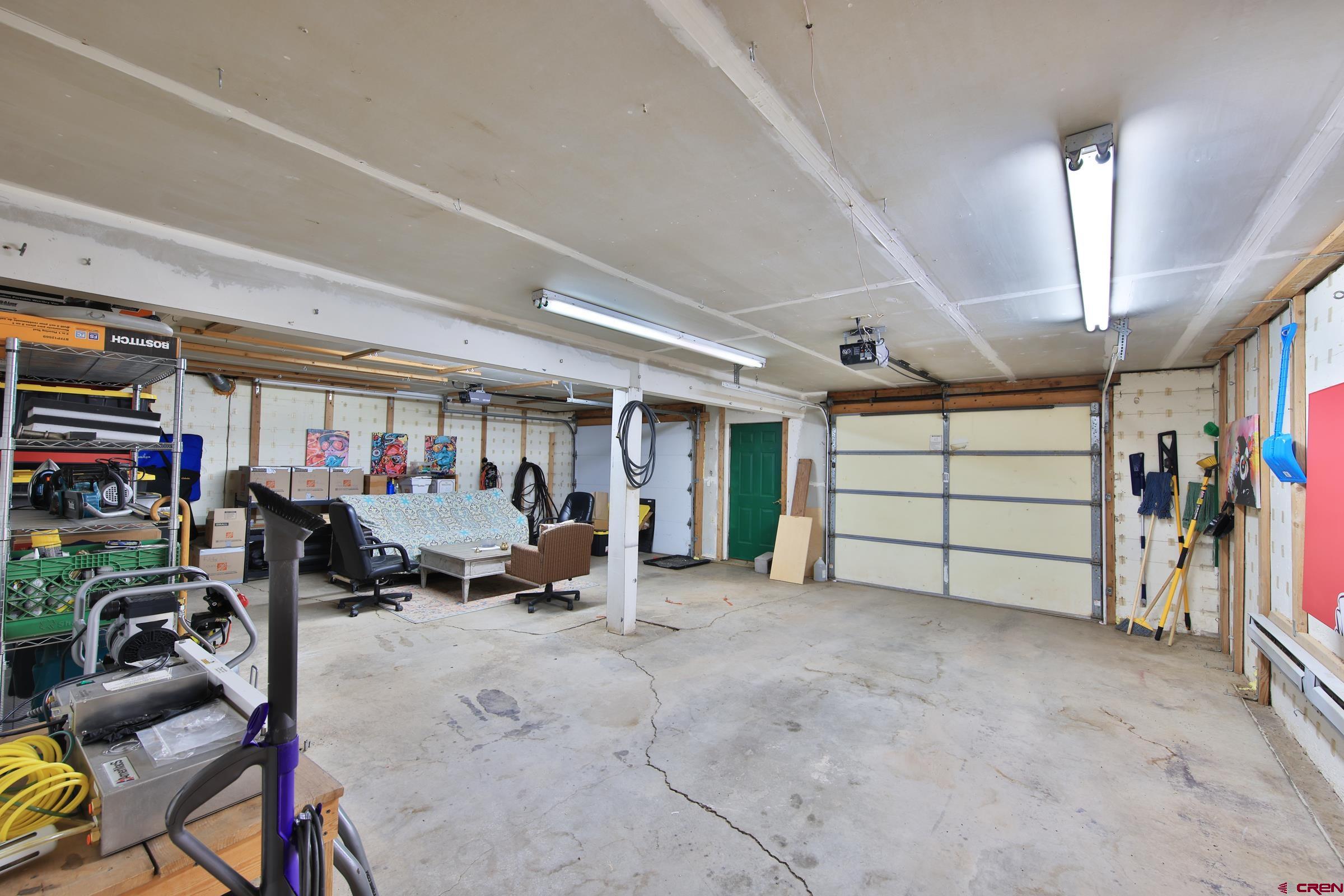 10822 60 75/100 Road Collbran, CO 81624 - Photo 26 of 45 a view of a garage with furniture