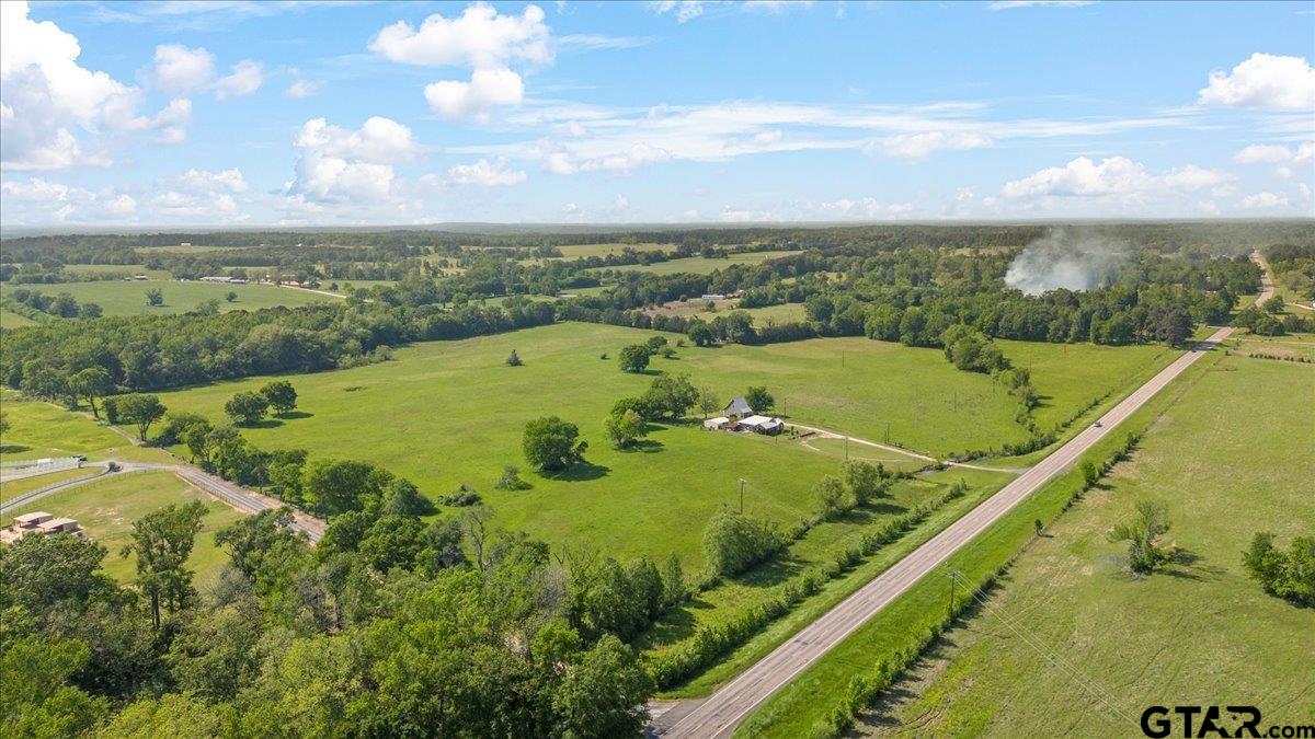 335 County Road 4802 Troup, TX 75789 - Photo 14 of 23 a view of a swimming pool and an outdoor seating