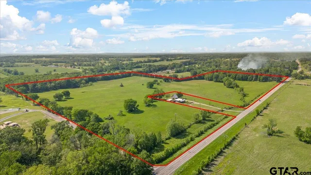 a view of a city with an ocean