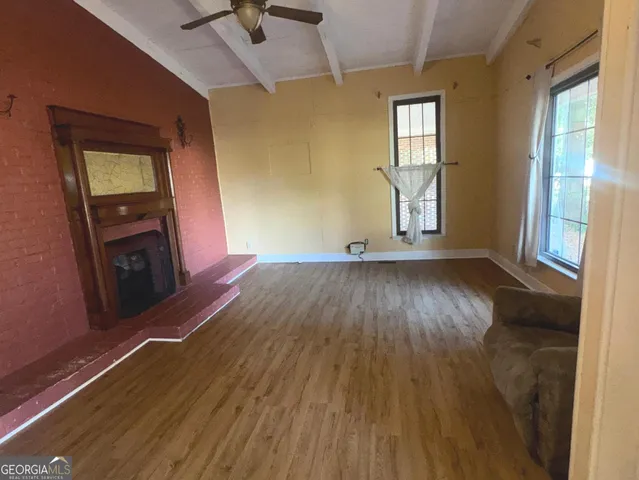 wooden floor and windows in a room