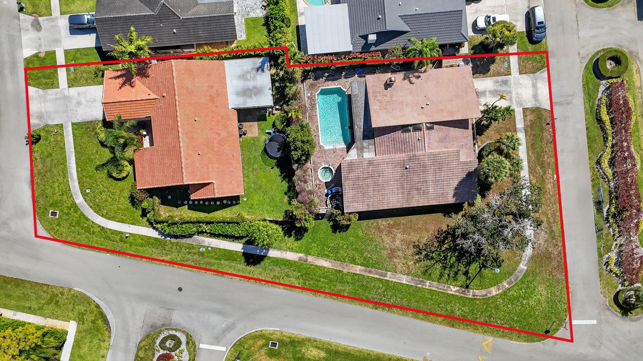 an aerial view of multiple houses with outdoor space