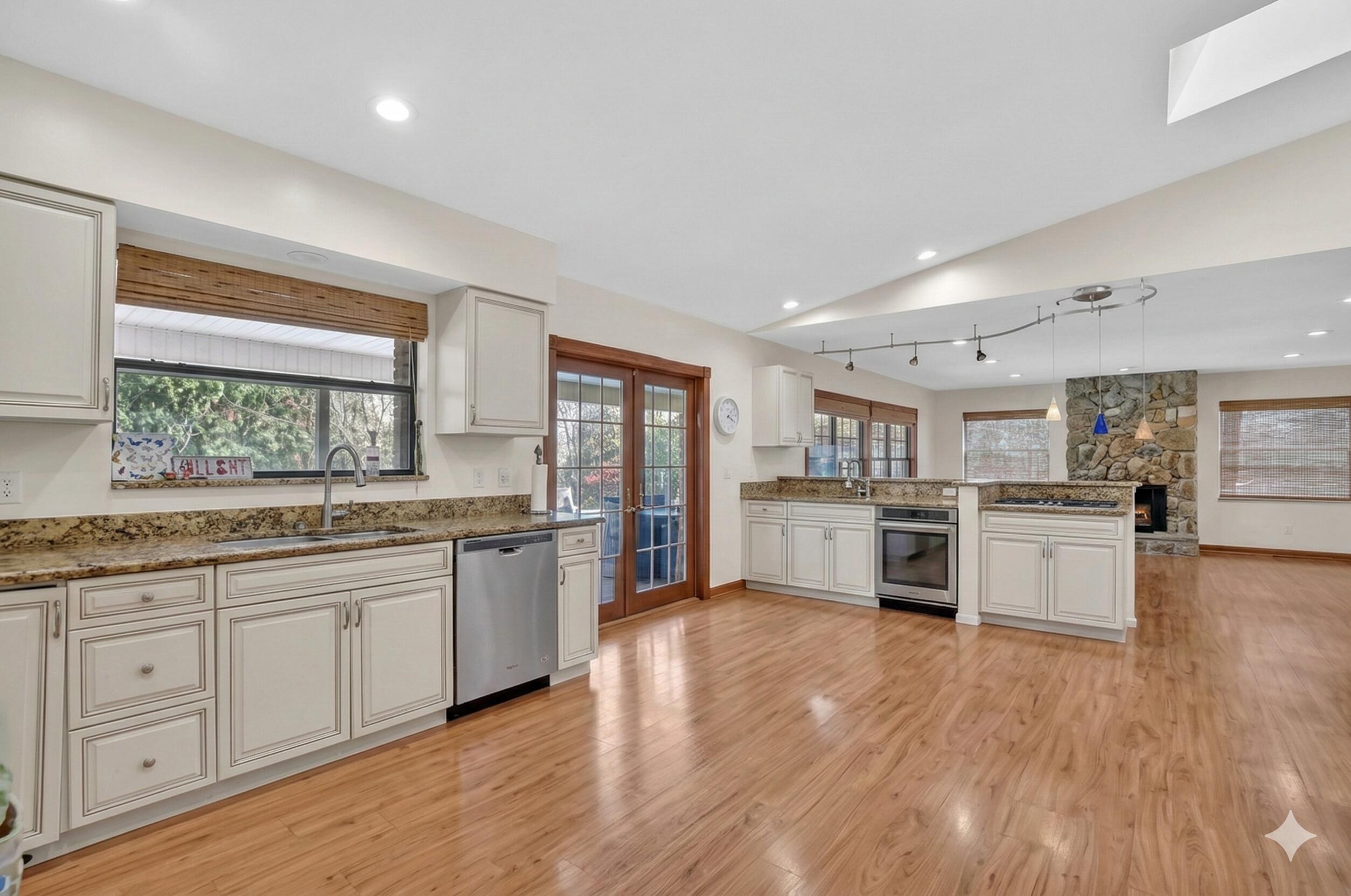 22220 Morning Glory Terrace Boca Raton, FL 33433 - Photo 16 of 69 a large kitchen with a lot of counter space and stainless steel appliances