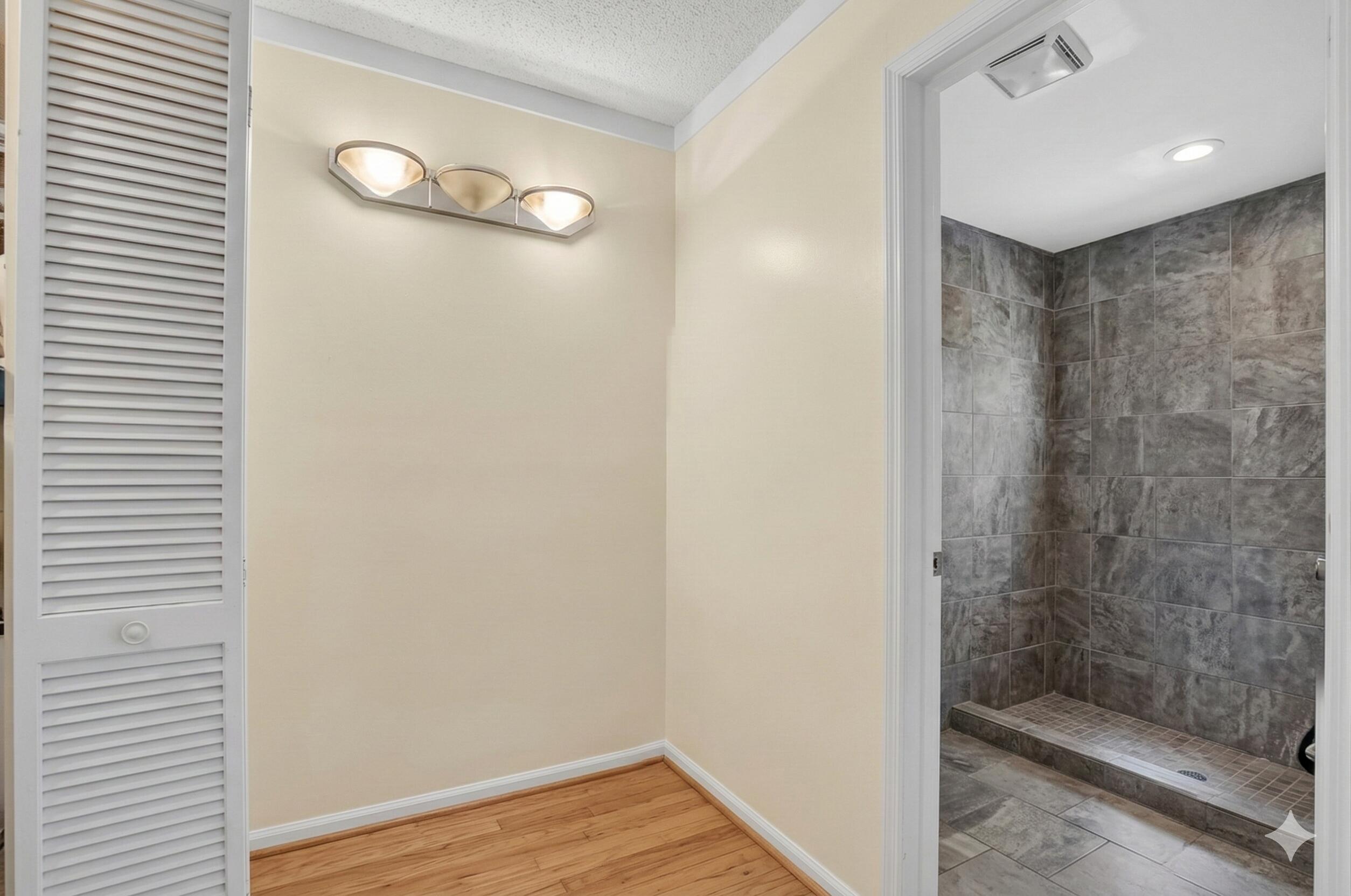 22220 Morning Glory Terrace Boca Raton, FL 33433 - Photo 21 of 69 a bathroom with a shower and a glass door