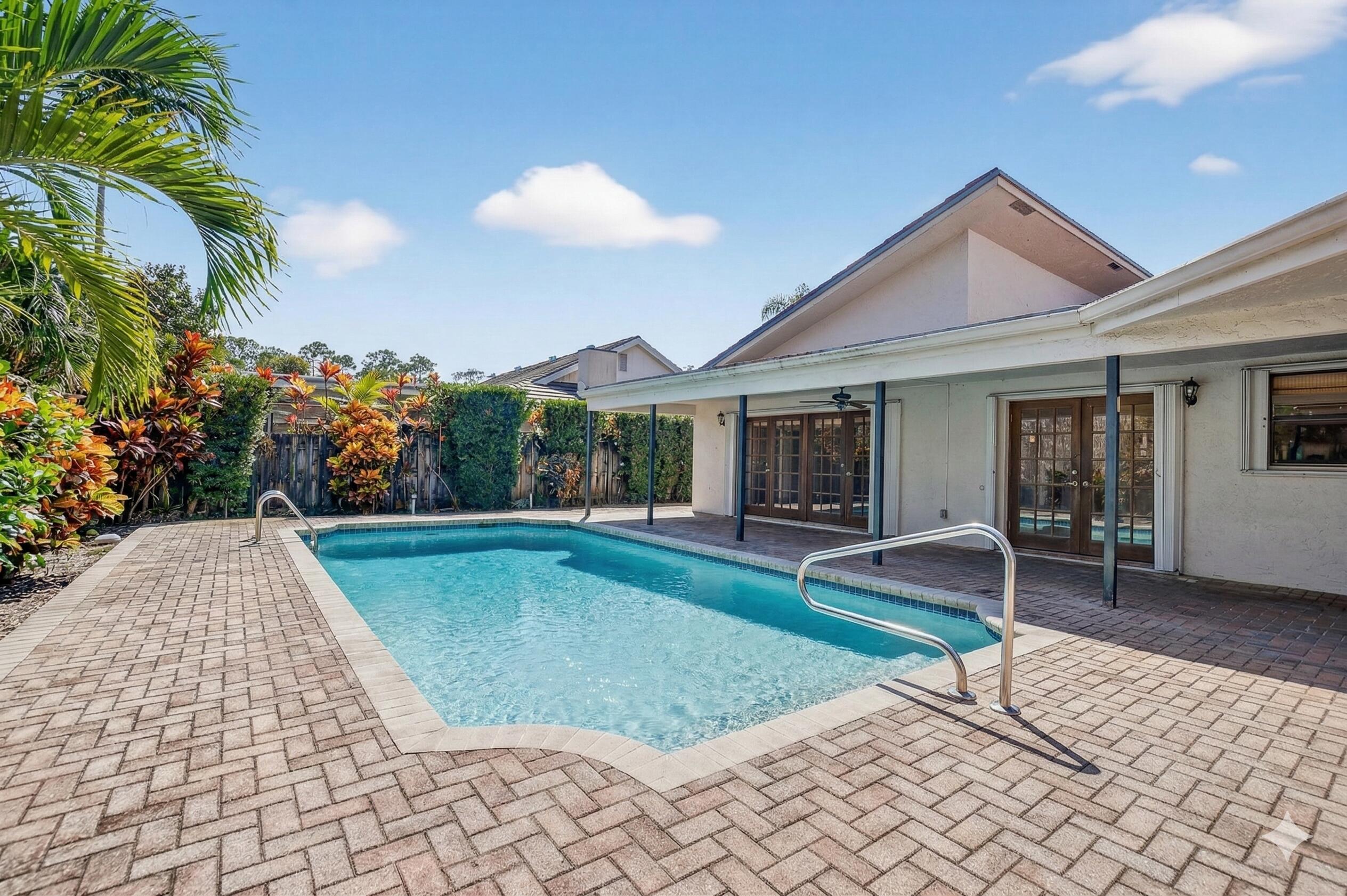 22220 Morning Glory Terrace Boca Raton, FL 33433 - Photo 30 of 69 a view of a house with backyard and porch