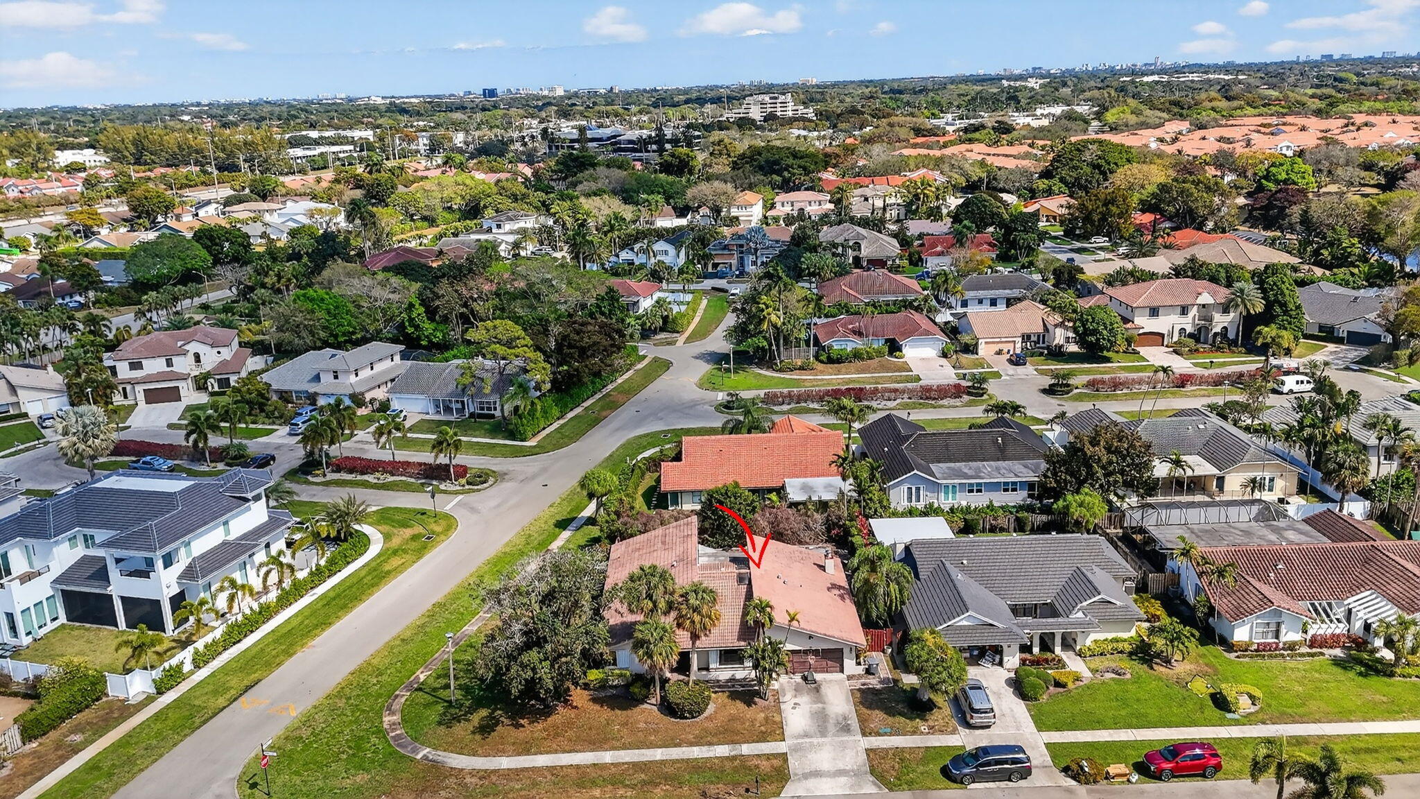 22220 Morning Glory Terrace Boca Raton, FL 33433 - Photo 38 of 69 an aerial view of a city with lots of residential buildings
