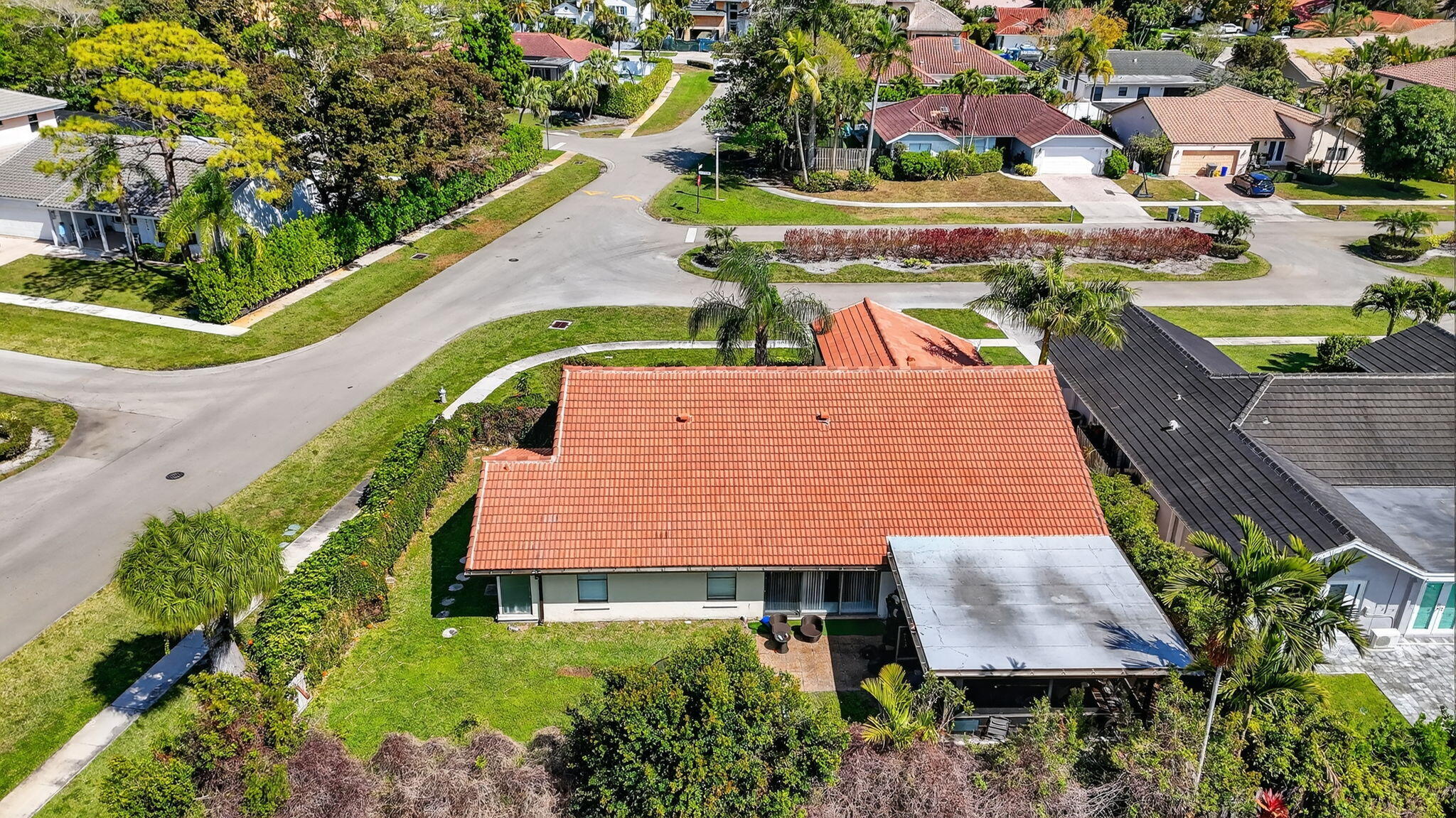 22220 Morning Glory Terrace Boca Raton, FL 33433 - Photo 56 of 69 an aerial view of a house with a yard and potted plants