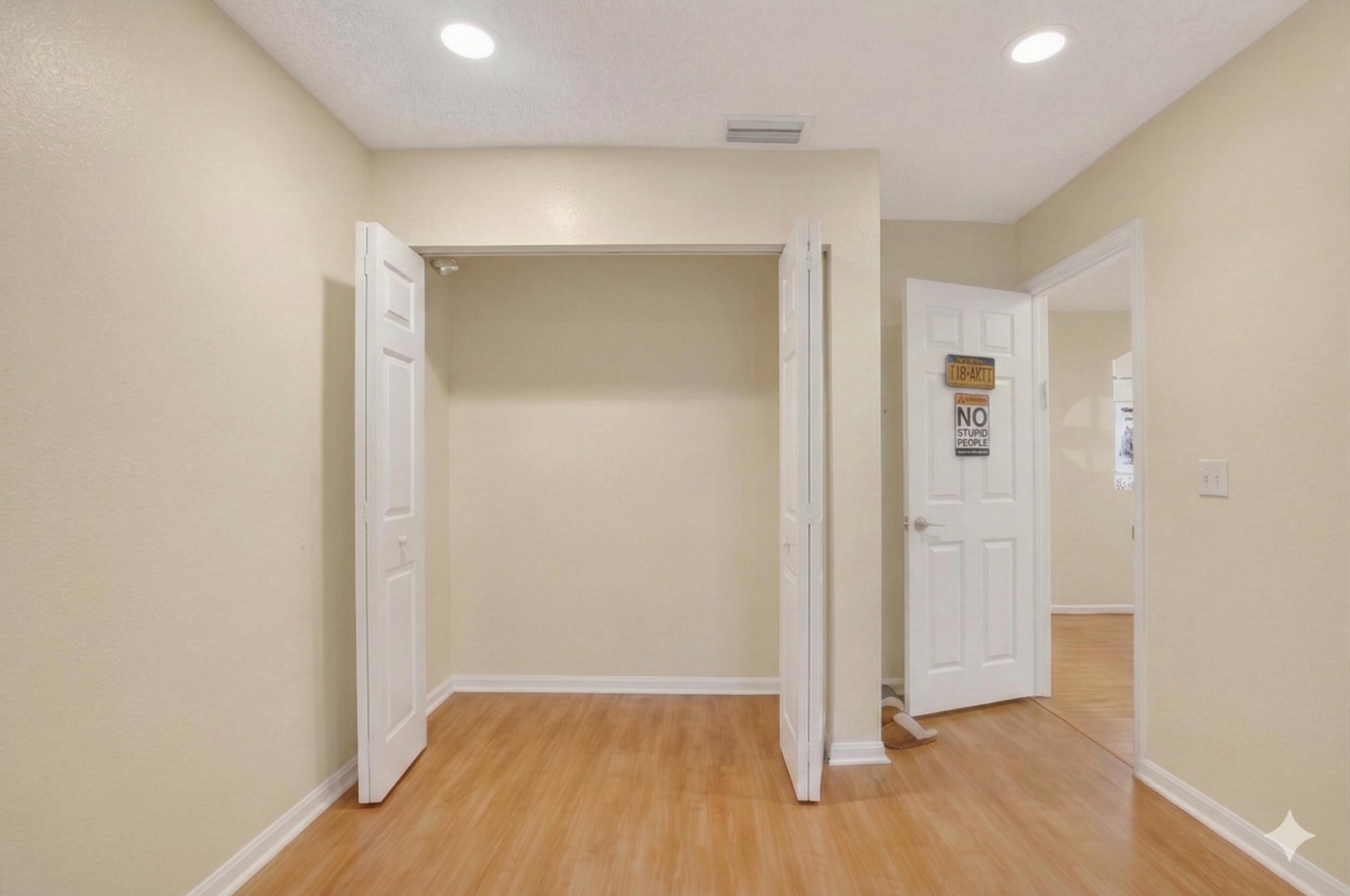 22220 Morning Glory Terrace Boca Raton, FL 33433 - Photo 58 of 69 an empty room with wooden floor & closet area