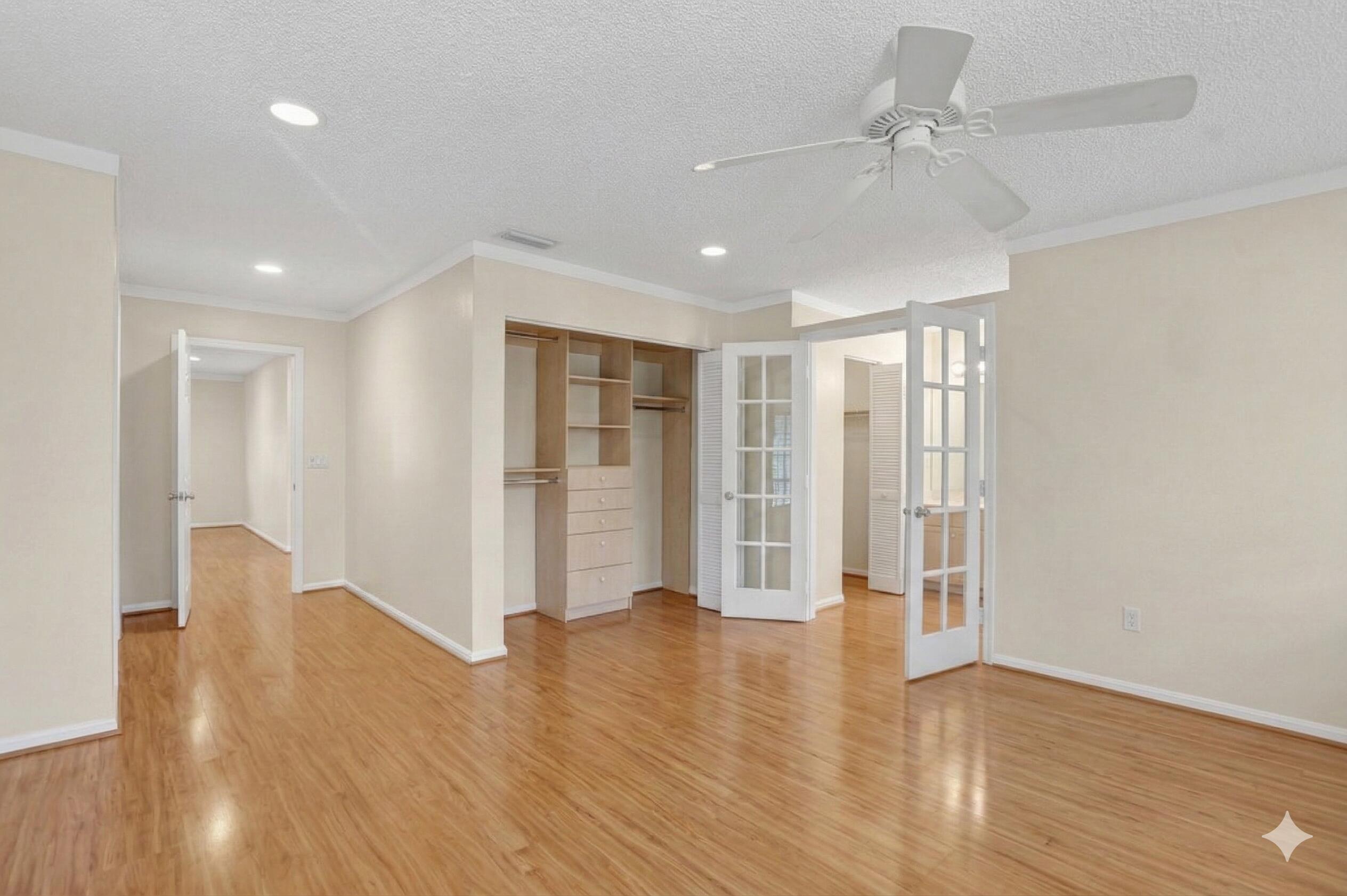 22220 Morning Glory Terrace Boca Raton, FL 33433 - Photo 68 of 69 a view of an empty room with wooden floor