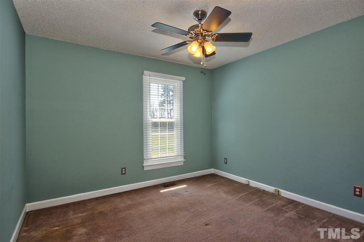 2937 Old Crews Road Raleigh, NC 27616 - Photo 12 of 19 an empty room with a window