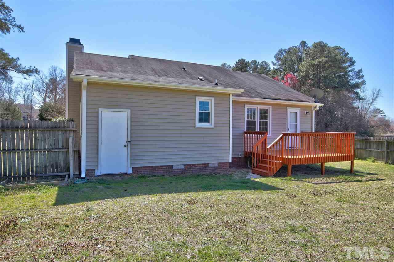 2937 Old Crews Road Raleigh, NC 27616 - Photo 16 of 19 a view of a house with a yard