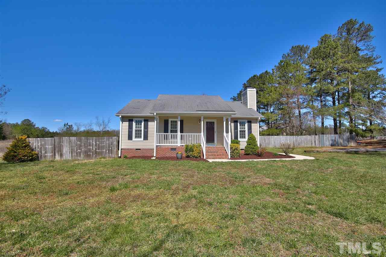 2937 Old Crews Road Raleigh, NC 27616 - Photo 19 of 19 a front view of a house with a yard