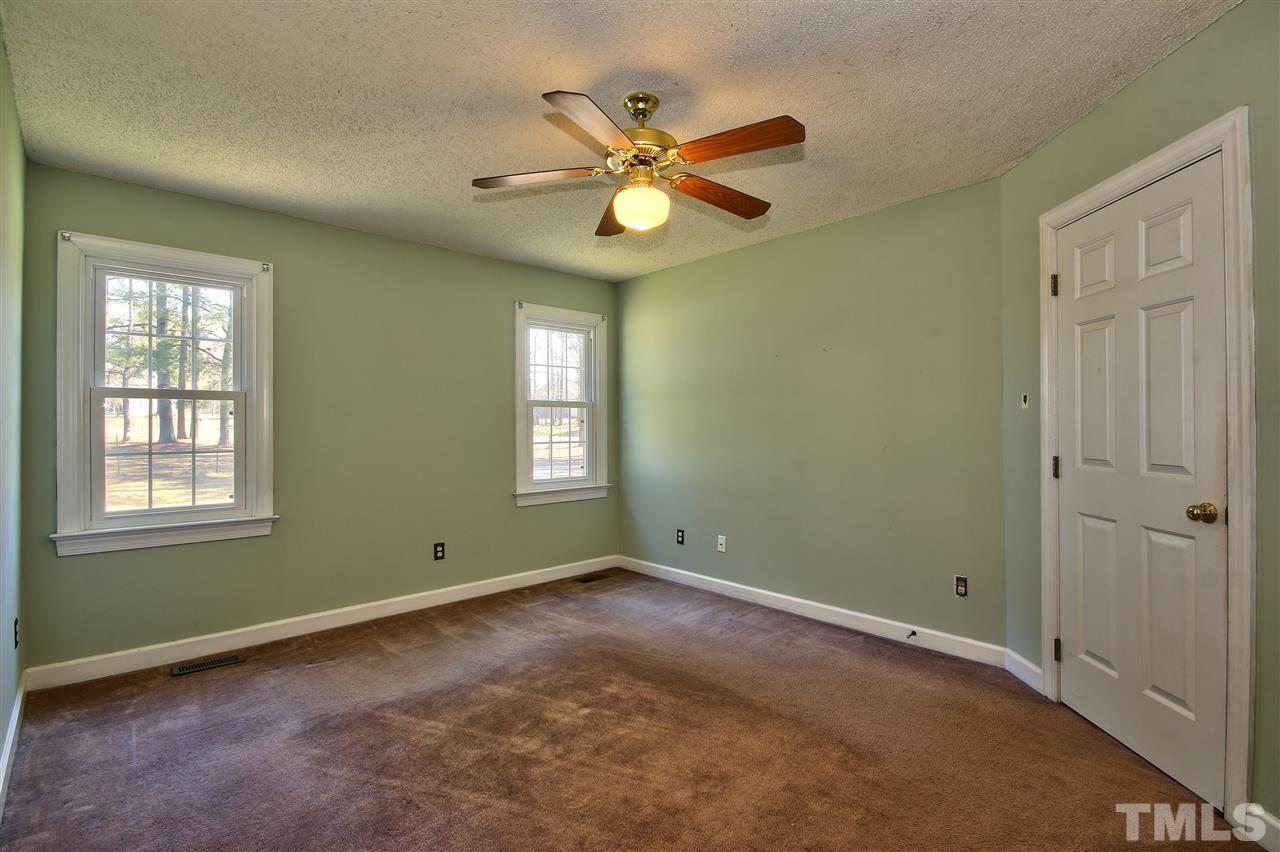 2937 Old Crews Road Raleigh, NC 27616 - Photo 5 of 19 a view of room with window and ceiling fan