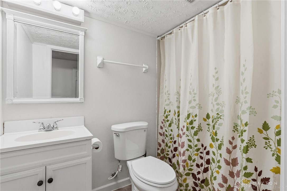 70 Martin Lane Springboro, OH 45066 - Photo 51 of 69 This clean and bright bathroom provides a comfortable and functional space.