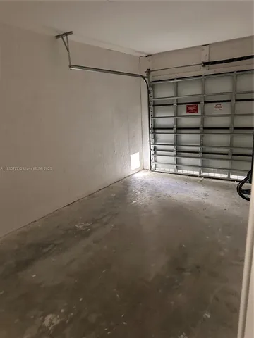 a view of a room with an empty space