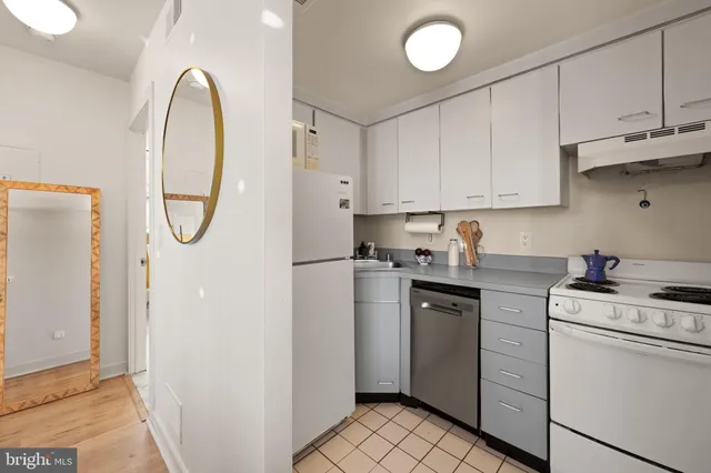 a view of a kitchen with washer and dryer