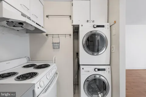 a white refrigerator freezer sitting in a kitchen