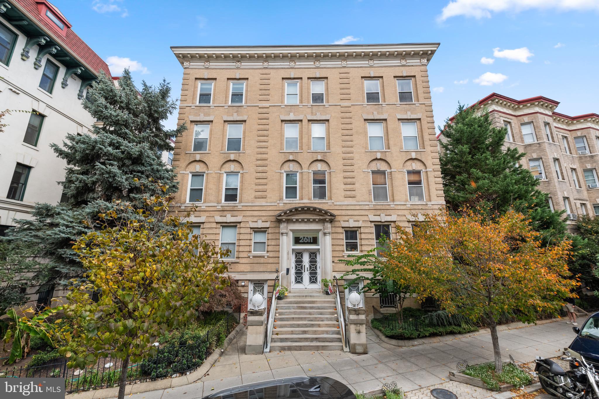 2611 Adams Mill Road Northwest, Unit 208 Washington, DC 20009 - Photo 5 of 22 a front view of a multi story building