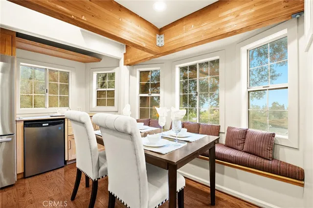 a living room with furniture and windows