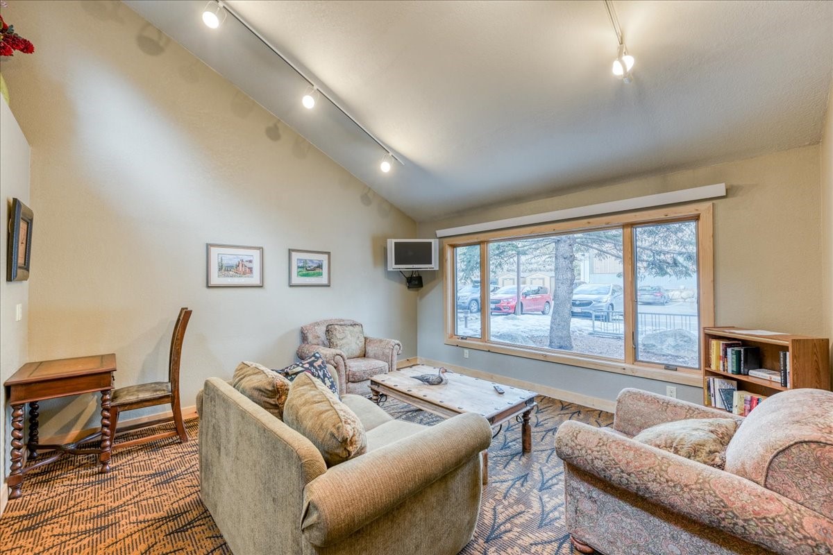 22280 Highway 6, Unit 1716 Keystone, CO 80435 - Photo 25 of 27 a living room with furniture and a window