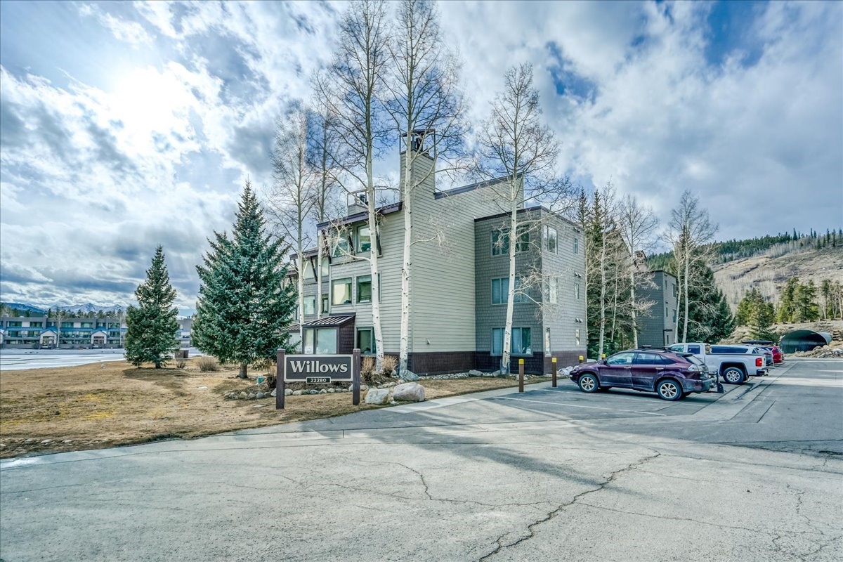 22280 Highway 6, Unit 1716 Keystone, CO 80435 - Photo 27 of 27 a building with trees in front of it
