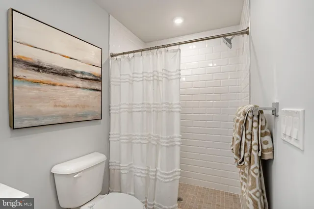 a bathroom with a bathtub