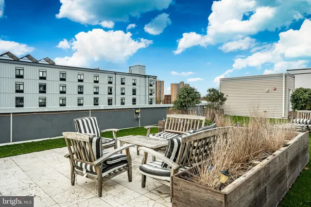 a outdoor living space with furniture and garden
