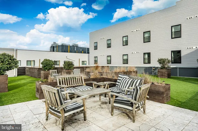 a view of balcony and kitchen