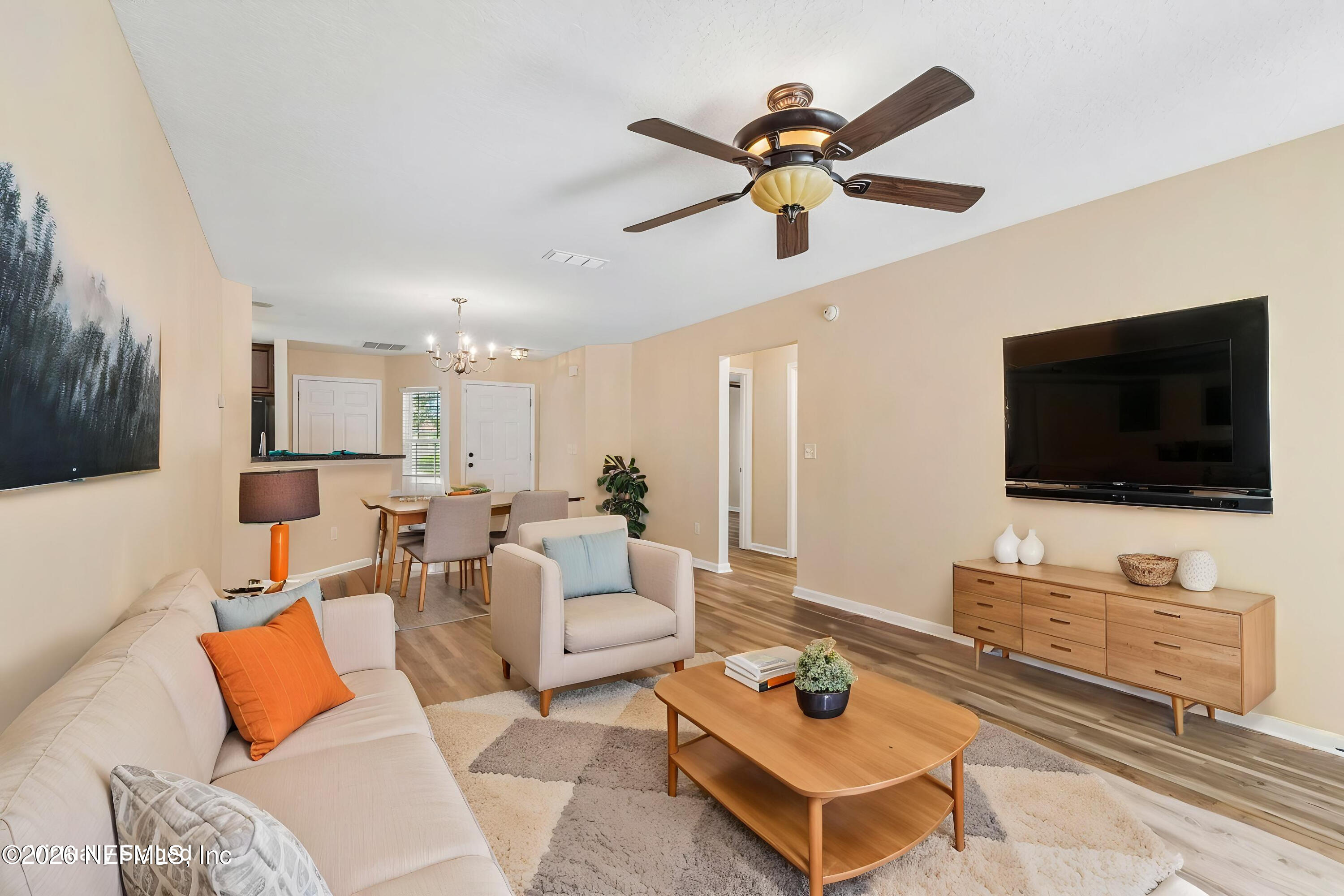 73 South Twin Maple Road St. Augustine, FL 32084 - Photo 20 of 59 a living room with furniture and a flat screen tv