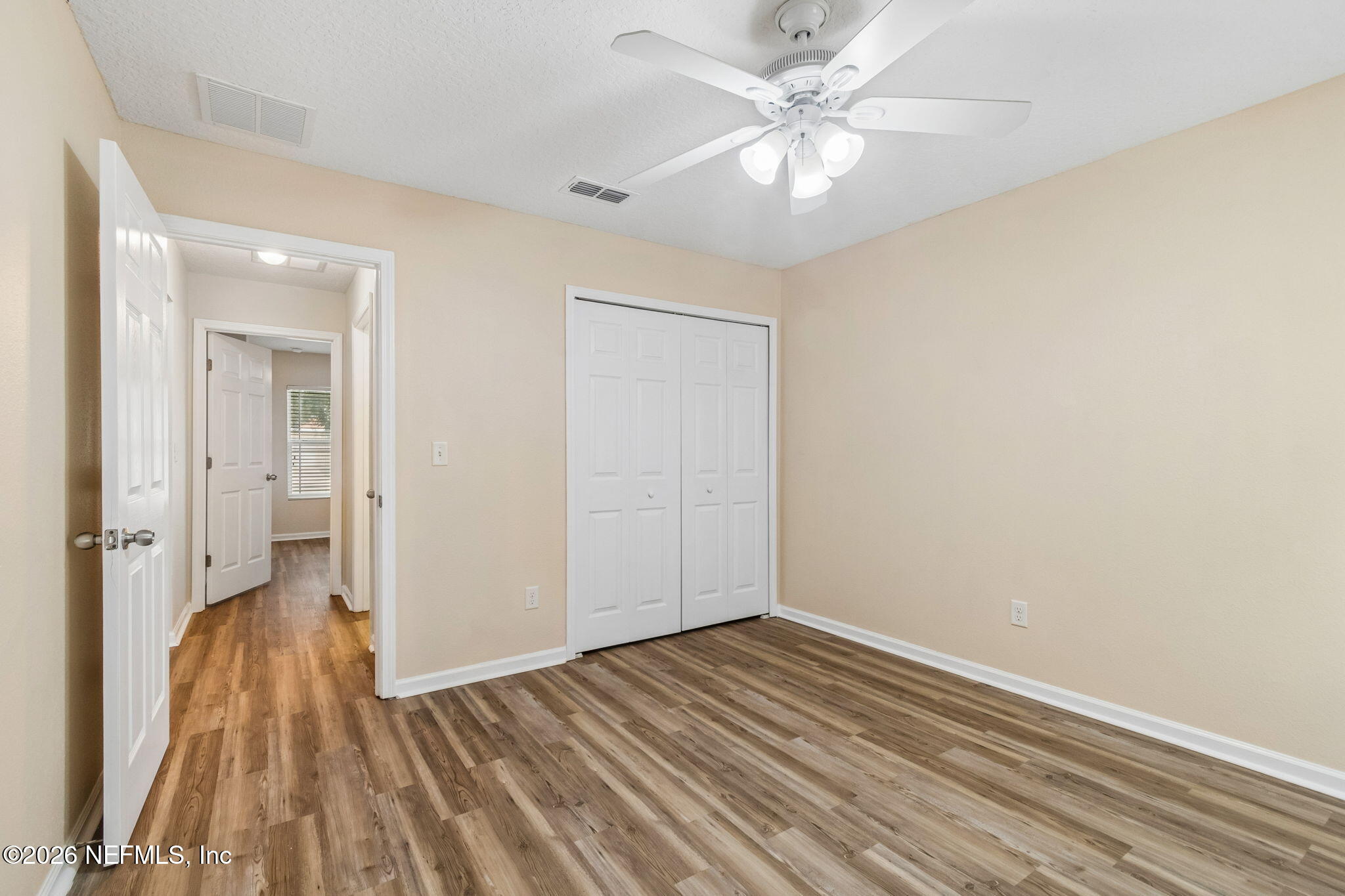 73 South Twin Maple Road St. Augustine, FL 32084 - Photo 26 of 59 wooden floor in an empty room with a window