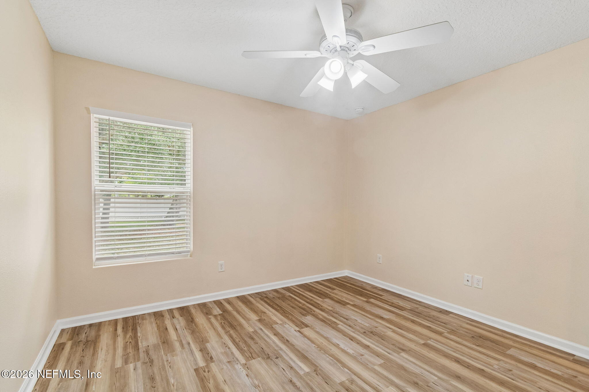 73 South Twin Maple Road St. Augustine, FL 32084 - Photo 28 of 59 wooden floor in an empty room with a window
