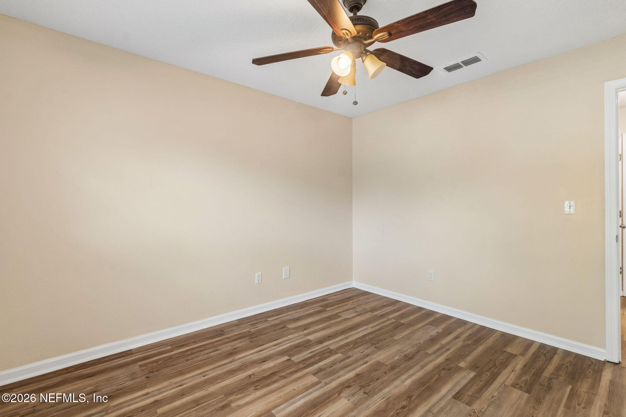 73 South Twin Maple Road St. Augustine, FL 32084 - Photo 30 of 59 an empty room with a fan and a fan