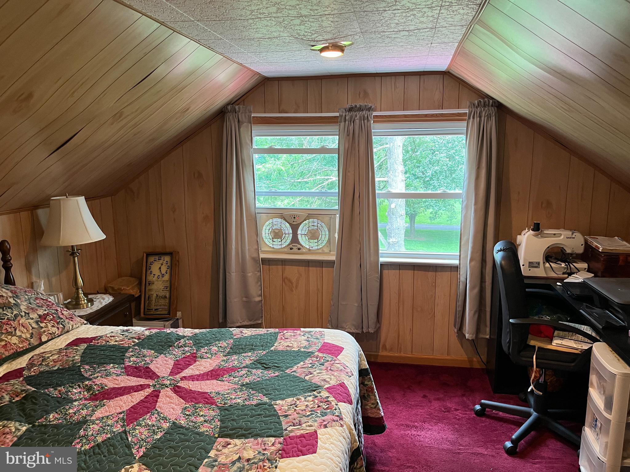 393 Mountain View Road Reading, PA 19607 - Photo 17 of 21 a bedroom with a bed and a window