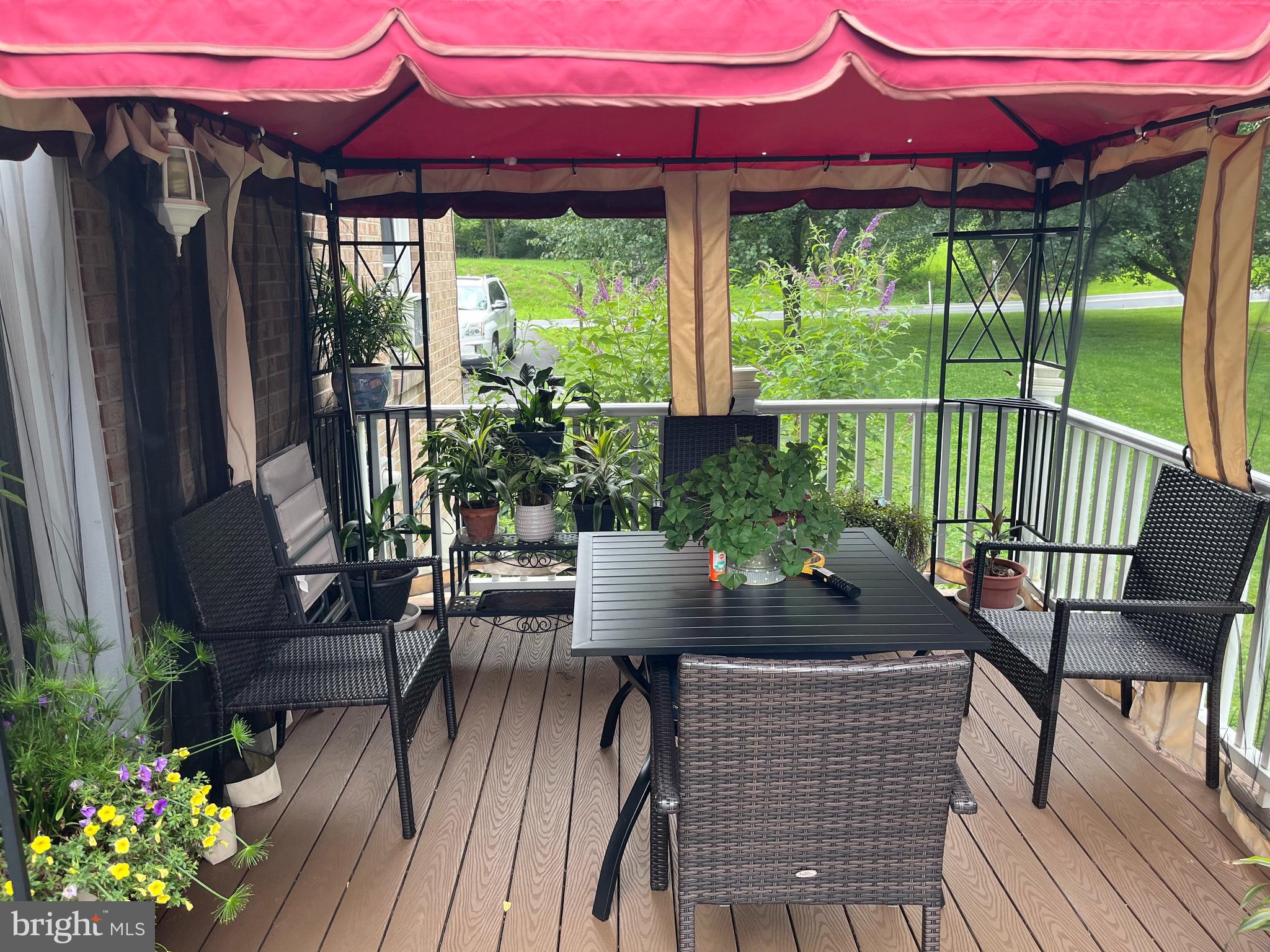 393 Mountain View Road Reading, PA 19607 - Photo 20 of 21 a view of balcony with outdoor seating and wooden floor