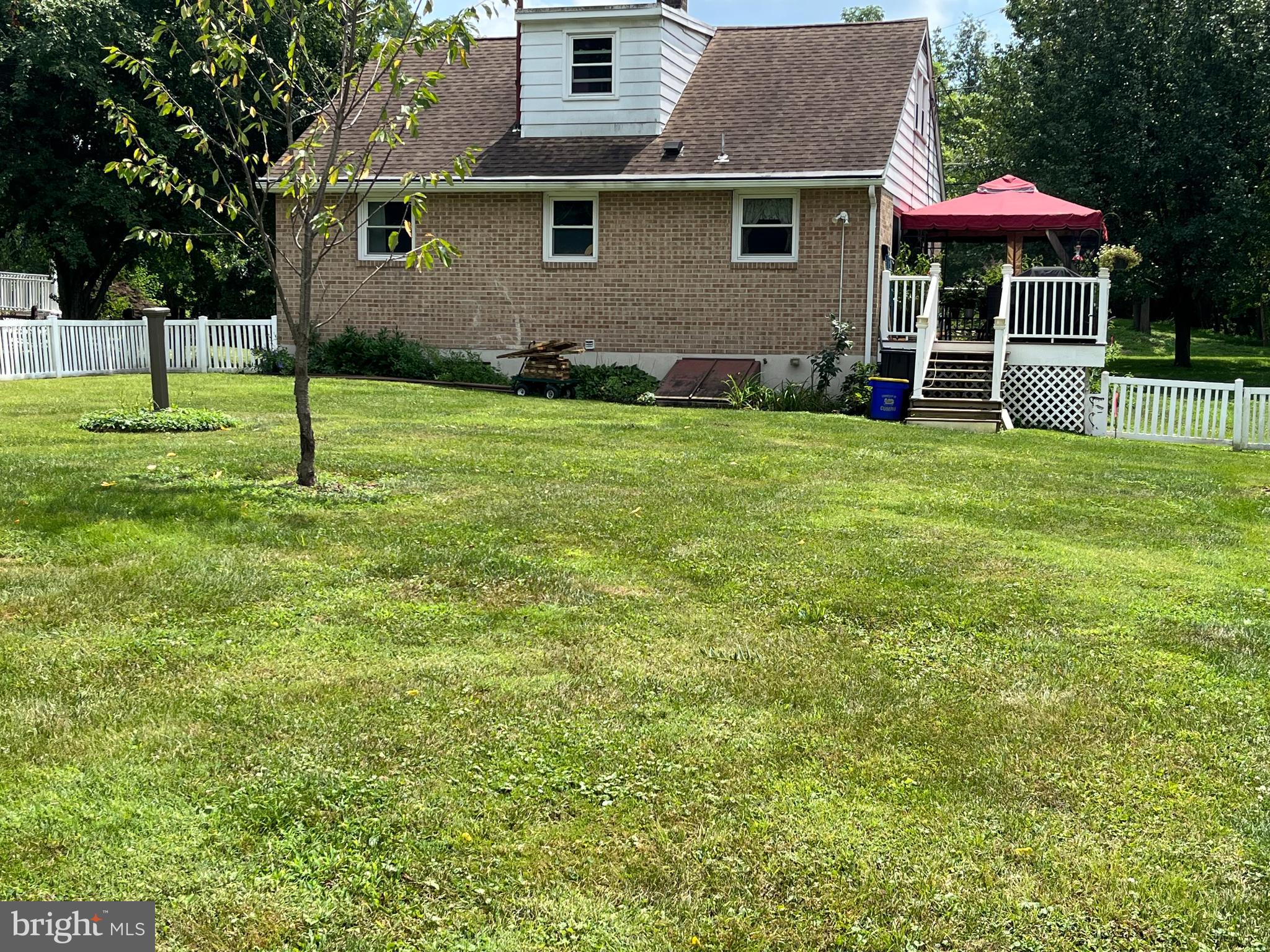 393 Mountain View Road Reading, PA 19607 - Photo 7 of 21 a front view of a house with a yard