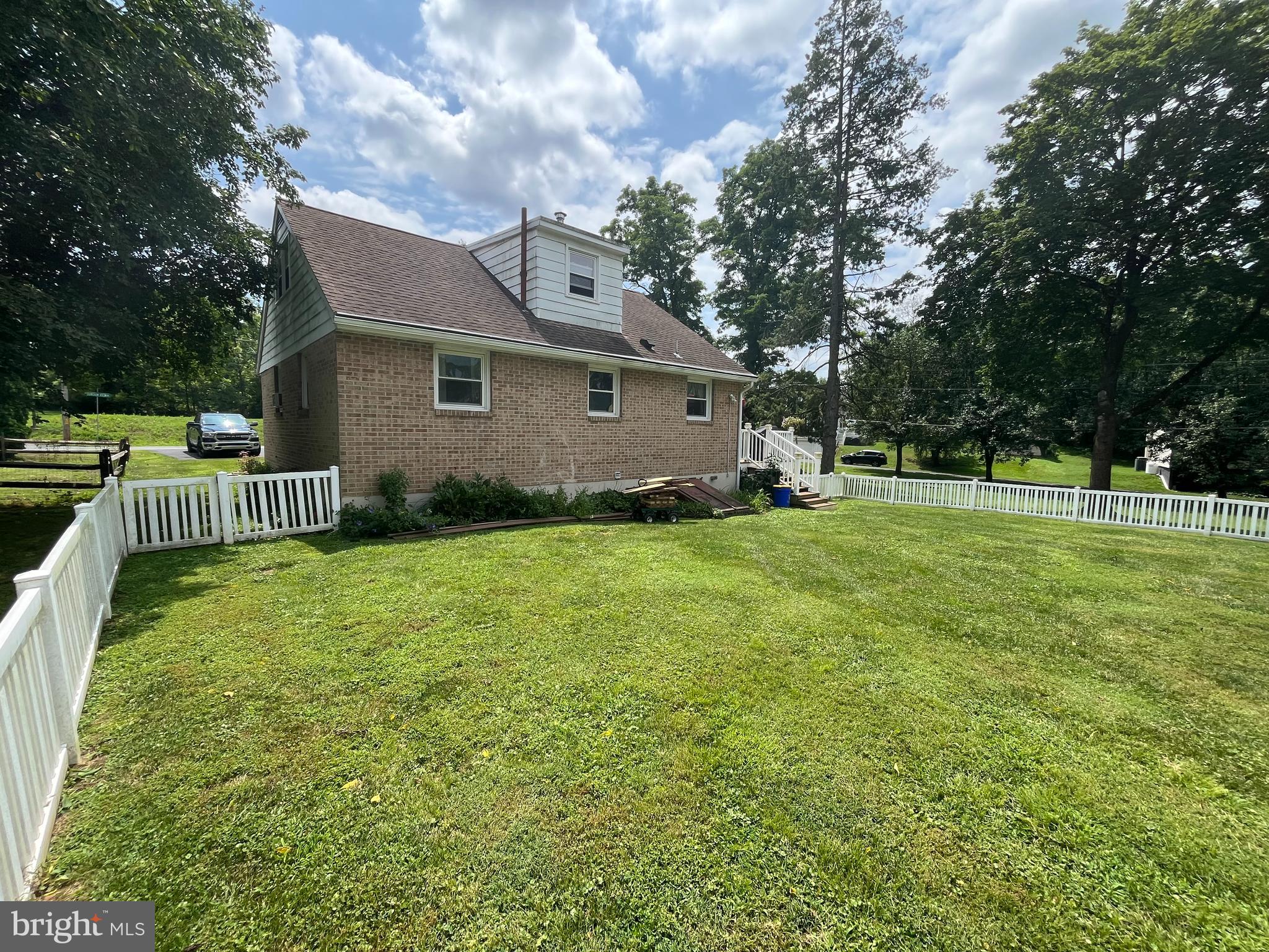 393 Mountain View Road Reading, PA 19607 - Photo 8 of 21 a view of an house with backyard and trees