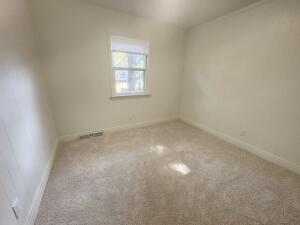 3872 South Hillcrest Road Knox, IN 46534 - Photo 15 of 27 an empty room with a window