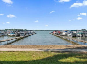 3872 South Hillcrest Road Knox, IN 46534 - Photo 25 of 27 a view of a lake with houses