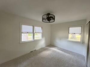 3872 South Hillcrest Road Knox, IN 46534 - Photo 9 of 27 an empty room with a window