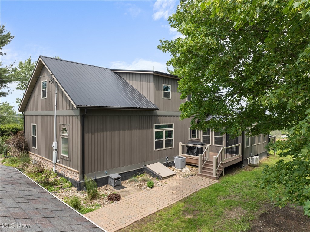 56380 Hospital Road Bellaire, OH 43906 - Photo 35 of 45 Rear view of house with a wooden deck and metal roof