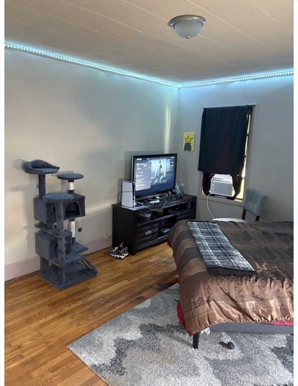 913 Rodman Street Fall River, MA 02721 - Photo 13 of 13 a living room with furniture and a flat screen tv
