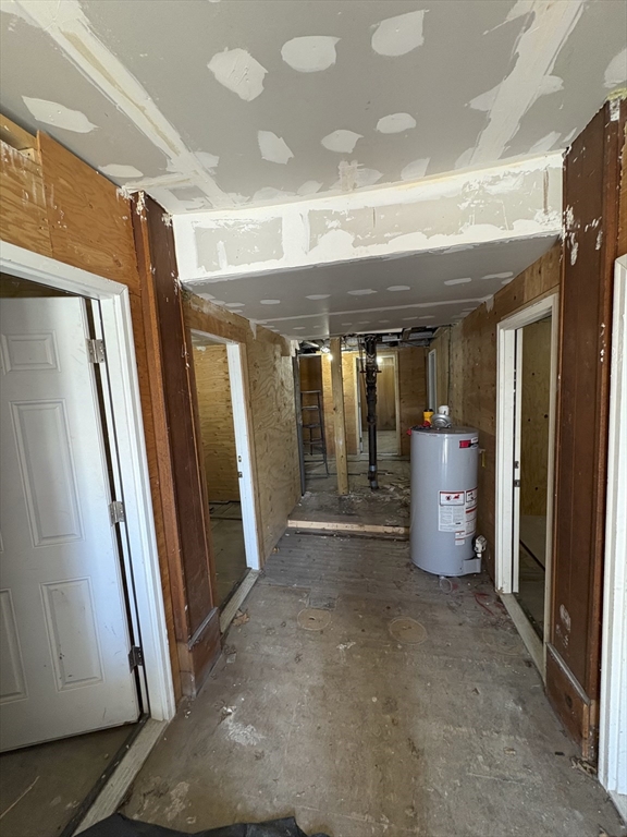 913 Rodman Street Fall River, MA 02721 - Photo 10 of 13 a view of a hallway with stairs