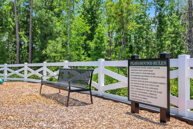 a view of a park with a slide