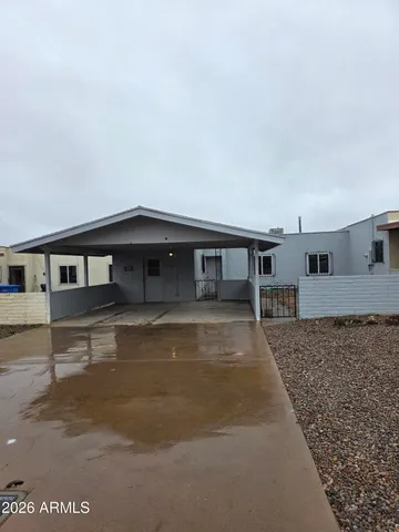 a view of a house with a patio