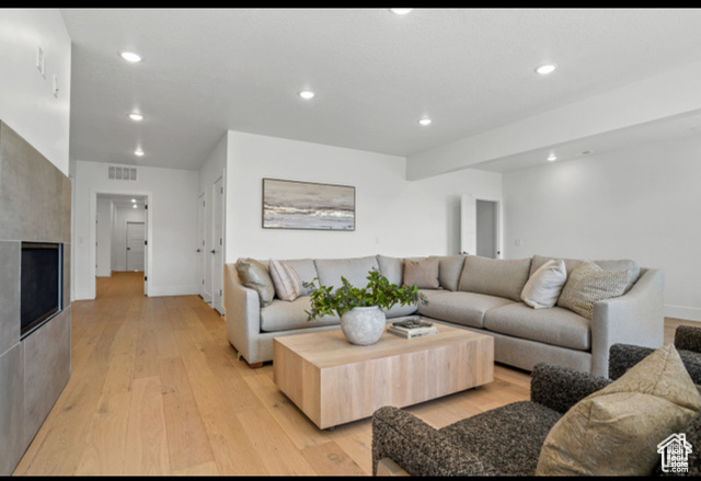 599 North Heritage Street, Unit 6 Mapleton, UT 84664 - Photo 22 of 37 Living room featuring light hardwood / wood-style floors