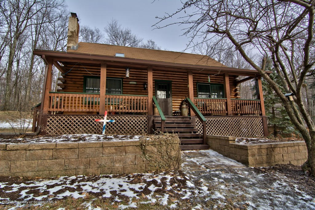 28 Elias Road Moscow, PA 18444 - Photo 1 of 69 a front view of a house with parking